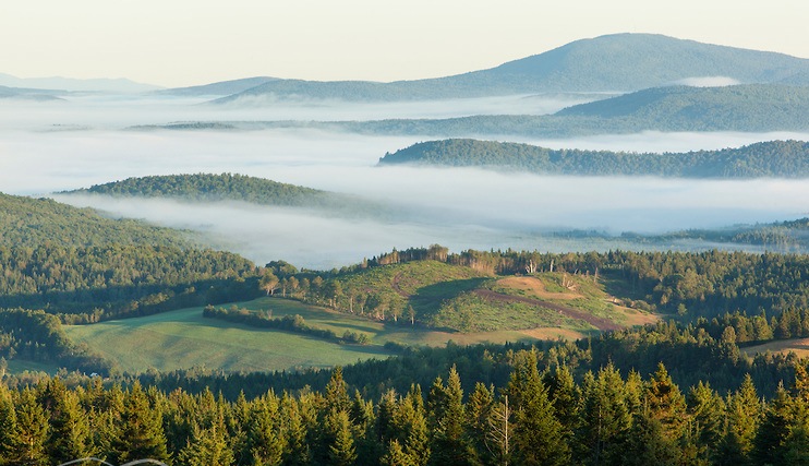 Fog in the Connecticut River Valley as seen from a hilltop farm in Stewartstown, New Hampshire.